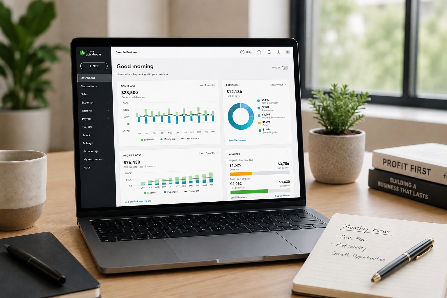 Laptop on a desk displaying professional bookkeeping dashboards and monthly financial reports